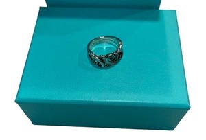 The Tiffany & Co Paloma Picasso Triple Loving Heart Ring in Silver
