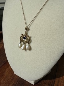 Vintage 14k Gold Necklace featuring a Sapphire Heart Pendant adorned with dangling pearls.