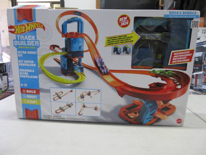 lot 41 image: Hot Wheels Track Builder Unlimited Ultra Boost Kit, Track Set, Open Box, Does not look used and all parts appear to be accounted for.