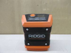 lot 205 image: Ridgid R84086B 18V Lithium Ion Cordless Mini Bluetooth Radio w Clock and USB Smart Phone Charging (Battery and Charger Not Included  Radio Only  NEW, TESTED, WORKS