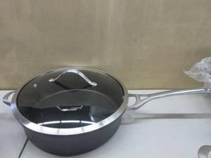 lot 269 image: Calphalon Contemporary Nonstick 5-Quart Saute with Glass Lid NEW DENTS, SCRATCHES, LID CLOSES BUT HAVE TO PUSH ON IT.