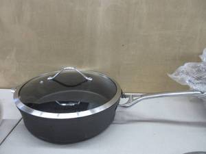 lot 270 image: Calphalon Contemporary Nonstick 5-Quart Saute with Glass Lid NEW, SMALL DENTS AND SCUFFS