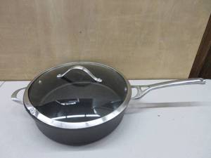 lot 285 image: Calphalon Contemporary Nonstick 5-Quart Saute with Glass Lid DAMAGED RIM ON LID, SCRATCHED, INNER RIM ON PAN. STILL IN GOOD USE SEE PICTURES FOR DETAILS.