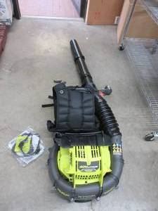 lot 373 image: Ryobi RY40440 40 Volt 145 MPH 625 CFM Cordless Brushless Variable Speed Backpack Leaf Blower with Lithium-Ion Battery and Charge Kit BROKEN HANDLE, NEVER USED, WORKS, MISSING BATTERY AND CHARGER. SEE PICTURES FOR DETAILS