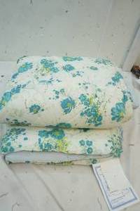 Flowered Light Blue and Green Blanket