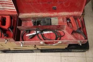 lot 562 image: Milwaukee Sawzall Reciprocating Saw with Metal Case