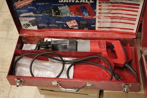 lot 563 image: Milwaukee Sawzall Reciprocating Saw with Metal Case