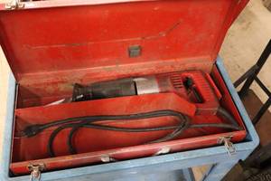 lot 567 image: Milwaukee Sawzall Reciprocating Saw with Metal Case