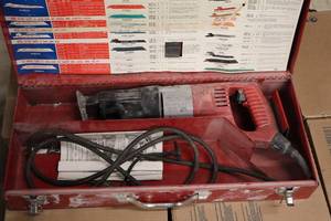 lot 565 image: Milwaukee Sawzall Reciprocating Saw with Metal Case