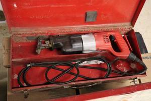 lot 566 image: Milwaukee Sawzall Reciprocating Saw with Metal Case