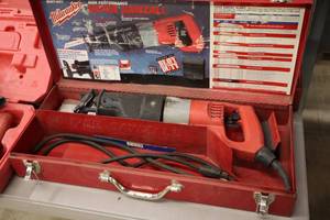 lot 574 image: Milwaukee Super Sawzall Reciprocating Saw with Metal Case