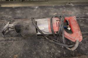 lot 585 image: Milwaukee Sawzall Reciprocating Saw
