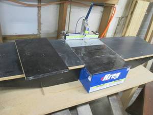 Kreg Foreman Benchtop pocket hole machine with attached workbench