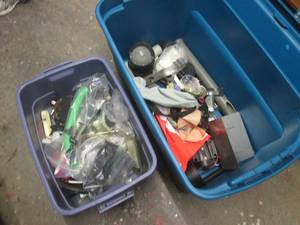 Coveted totes containing a variety of misc new and preloved boating and other marine supplies