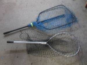 (2) long handled fishing nets...