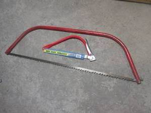 Campers bow saw and large hack saw...