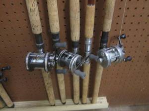 5-assorted fishing rods and 3-reels...