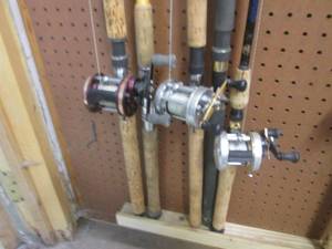 5-assorted fishing rods and 3-reels...