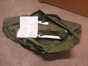 Fold-up camping cot with travel case