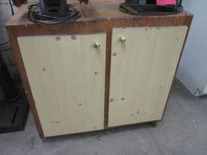 Hand made wood shop cabinet measuring approximately 382535