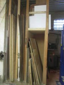 Collection of plywood and other assorted paneling and wood in both full and partial sheets along with other size pieces