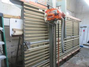 Holz-Her Super Cut 1265. (Buyer is SOLELY responsible to bring necessary tools, aids and any personal aids to assist with the removal of this MASSIVE wall sized wood cutting tool)