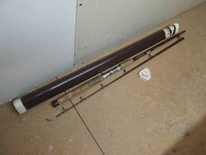 Fenwick PLP56 hardside fishing rod case with fishing pole