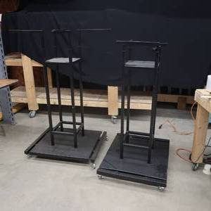 lot 121 image: 2 BLACK ROLLING SHIRT RACKS