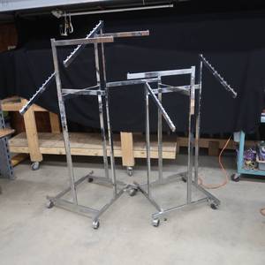 lot 122 image: 2 SILVER ROLLING SHIRT RACKS