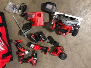 Milwaukee M18 18V Lithium-Ion Cordless Combo Kit (5-Tool) with 2-Batteries, Charger and Tool Bag   Customer Returns See Pictures