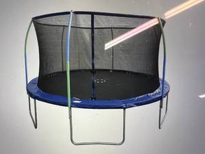 lot 10 image: 12 Round Trampoline with Enclosure
