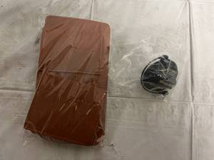 lot 65 image: Car Seat Storage Compartment and Replacement Gas Cap