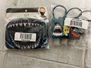 lot 123 image: Kids Face Protector and 3 Hand Sanitizer Cases