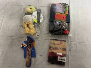 lot 143 image: Two Dog Toys, Medium Dog Collar, and Small Dog Pajama Set