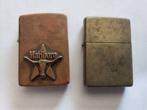 lot 16 image: 2 Zippos - Marlboro and Brass