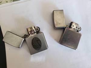 lot 21 image: 2 Zippos - Eagles Soaring and Other