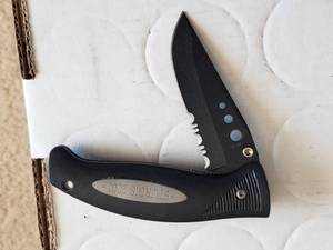 lot 59 image: Sturgis 2001 Folding Pocket Knife
