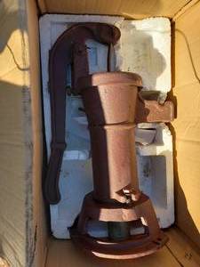 lot 207 image: Cast Hand Water Pump and Pipe
