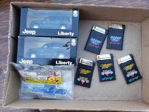 lot 213 image: Jeep Liberty Toys, Chevy Emblem, Miller and Ford Lighters