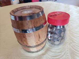 lot 272 image: Wood Barrell Bank and Plastic Jar of Wheat Pennies