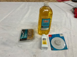 lot 54 image: TIki torch fuel, sink strainer, bathrom cleaner, & door hardware- ALL NEW