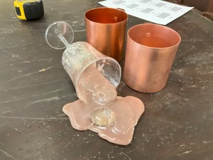 lot 211 image: 2 moscow mule mugs & fake spill gag glass