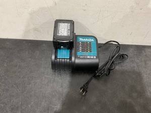 lot 250 image: Makita  Battery and Charger