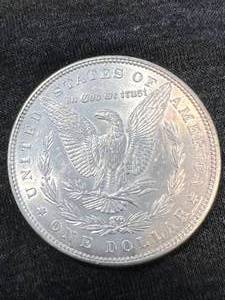 lot 35 image: 1886 US MORGAN SILVER DOLLAR BU