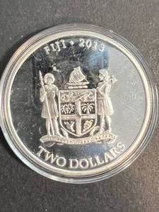 lot 55 image: 1 TROY OZ .999 FINE SILVER 2013 FIJI ROUND IN AIRTITE