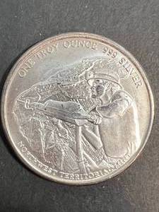 lot 57 image: 1 TROY OZ .999 FINE SILVER NW TERRITORIAL MINT ROUND