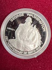 lot 74 image: 1982 US 90% SILVER WASHINGTON COMMEM HALF DOLLAR
