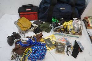 lot 24 image: Man bags, bungee cords, ropes, gloves, knife, binoculars and other