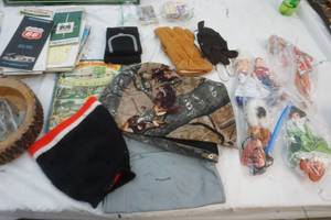 lot 29 image: Dolls, skimo doll, gloves, old maps, sports cards and poster