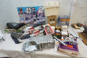 lot 34 image: Hood ornament and lot of automotive